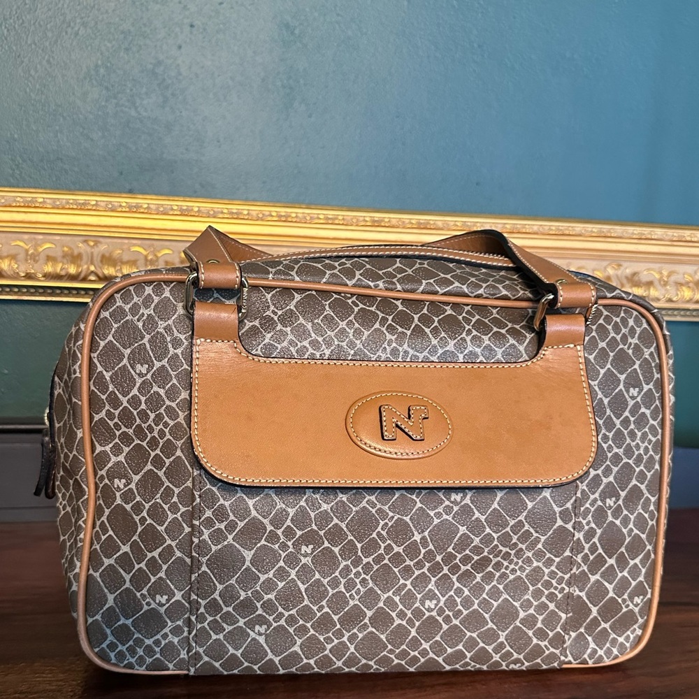 Nina Ricci Tan Leather Accent